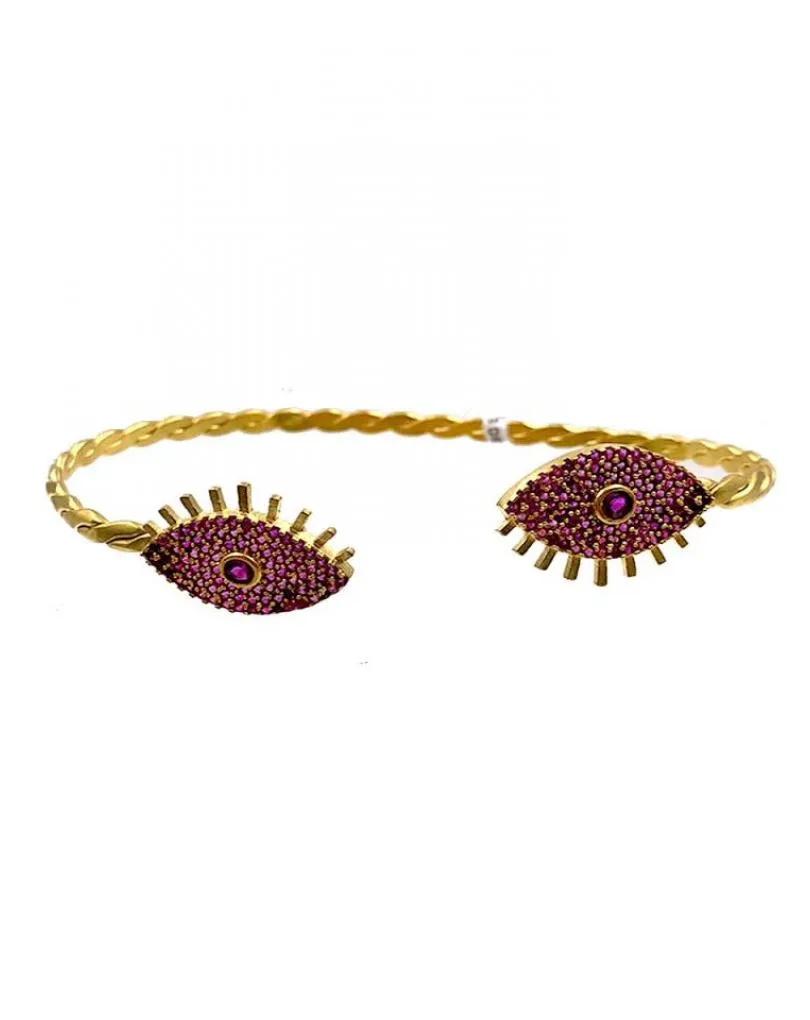 PULSERAS DORADAS Y FUCSIAS CON OJO TURCO DE LA SUERTE
